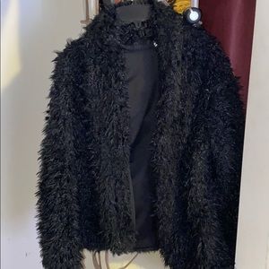 Black faux fur coat